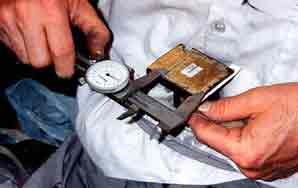 Tefillin being checked and repaired